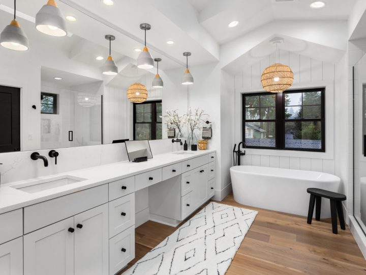 Modern Well-lit bathroom with multiple pendant lights to illuminate the area especially in the vanity area